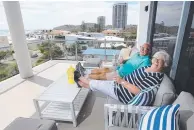  ??  ?? Jenny and Ray get settled into the penthouse of the unit complex they won in an RSL Art Union draw.