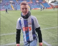  ??  ?? Ross Dobson performed keepy-ups before passing the match ball to the referee prior to a Kilmarnock v Hamilton Academical match.