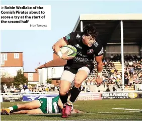  ?? Brian Tempest ?? > Robin Wedlake of the Cornish Pirates about to score a try at the start of the second half