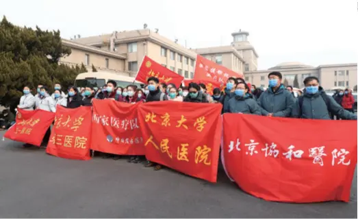  ??  ?? On January 26, members of the national medical team take a group photo at the Beijing Capital Internatio­nal Airport before their departure to Wuhan in Hubei Province to fight the novel coronaviru­s outbreak. The team included doctors from Peking University People’s Hospital