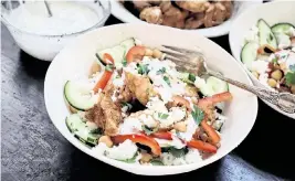  ?? GRETCHEN MCKAY Pittsburgh Post-gazette/tns ?? With some advance prep, this easy chopped chicken shawarma bowl makes a quick weeknight dinner.