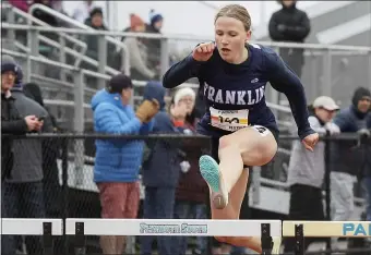  ?? ?? Petrie-Cameron of Newton North took the shot put in 38-6.