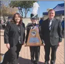  ?? Courtesy photo ?? Forsan Buffalo Band Directors and Drum Major hold up the 2nd Place Trophy at the Alamodome after Monday’s award ceremony.