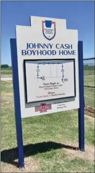  ?? ?? A sign at Historic Dyess Colony shows the route to Johnny Cash Boyhood Home.