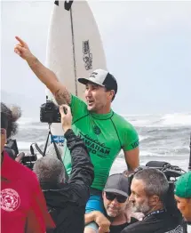  ?? Picture: AFP ?? Joel Parkinson celebrates winning in Hawaii.