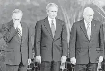  ?? Associated Press file photos ?? Defense Secretary Donald Rumsfeld, left, collects himself as he joins President George W. Bush and Vice President Dick Cheney for his farewell ceremony at the Pentagon in 2006.