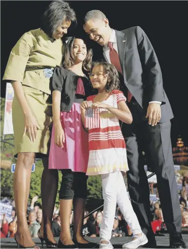  ??  ?? The Obamas at an Iowa rally during his first presidenti­al campaign in 2008