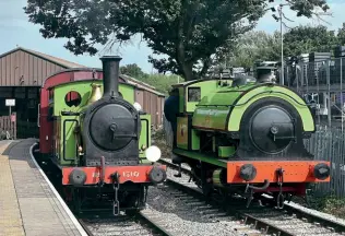  ?? BEN BUCKI ?? NER 0-4-0T No. 1310 prepares to depart Moor Road with a late-morning passenger train as debutante Swanscombe No. 6 waits in the loop beneath sunny skies on September 5.