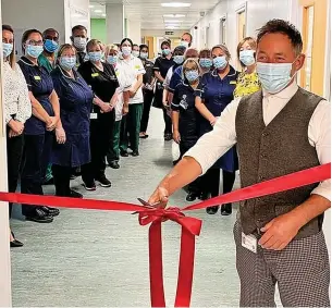  ?? ?? ● Rochdale Care Organisati­on chief officer Steve Taylor opens the new unit at the Infirmary