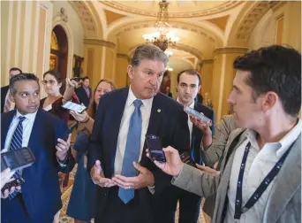  ?? (Tom Brenner/Reuters) ?? SEN. JOE MANCHIN speaks to news reporters on Capitol Hill in Washington last month.