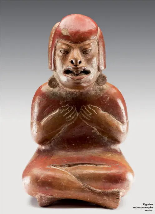  ??  ?? Figurine anthropomo­rphe
assise.