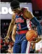  ?? JOSHUA L. JONES / ATHENS BANNER-HERALD VIA AP ?? Ole Miss guard Breein Tyree celebrates as the Rebels overcame a 10-point deficit.