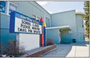  ?? (AP/Independen­t Record/Thom Bridge) ?? Jefferson Elementary School in Helena, Mont., is among schools closed because of the pandemic. With schools closed and teachers unable to report suspected cases of abuse, child welfare agencies have lost some of their best eyes and ears for family abuse cases.