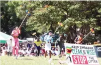  ?? ?? Iyasa drama and dance group performs a play about the need and importance of keeping the country clean during a clean-up campaign in Harare yesterday