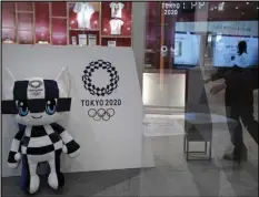  ??  ?? \Miraitowa, a mascot for the Tokyo 2020 Summer Olympics, is displayed last month at an Olympic Corner in Tokyo.