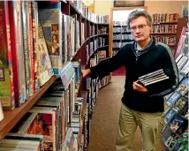  ??  ?? Richard Swainson at his DVD rental store Auteur House in Victoria St, Hamilton.