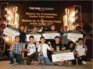  ??  ?? Tatsun Hoi standing among Malaysia Top 10 Outstandin­g Young Artists Awards 2017 winners.