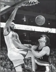  ?? AP/ MARCIO JOSE SANCHEZ ?? Golden State center JaVale McGee ( left), stepping up several key players out for Wednesday’s game against Portland, had 15 points, 5 rebounds and 4 blocked shots to help the Warriors blow past the Trail Blazers 110- 81 to grab a 2- 0 lead in their NBA...