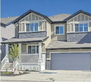  ??  ?? Streetscap­e Series homes feature a front-attached garage that is recessed into the structure, a setup that is “pretty prevalent down east.”