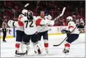  ?? PATRICK SMITH — GETTY IMAGES/TNS ?? Panthers goaltender Sergei Bobrovsky (72) celebrates with teammates after the series-clinching overtime goal.