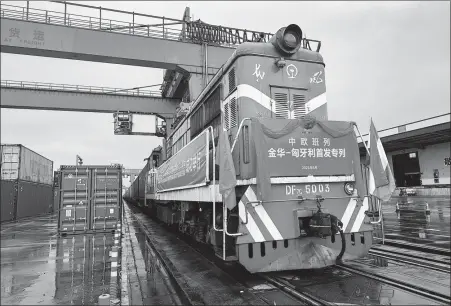  ?? HU XIAOFEI / XINHUA ?? A China-Europe Express Train from Jinhua, Zhejiang province, sets off for Budapest, Hungary, on June 7, carrying 100 containers loaded with electronic products and machinery parts. The train arrived in Budapest 18 days later.