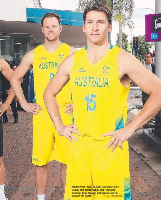  ?? Picture: JUSTIN BRIERTY ?? ARCHRIVALS: New Zealand Tall Blacks Finn Delany and Jarrod Kenny and Australian Boomers Brad Newley and Damian Martin prepare for battle.