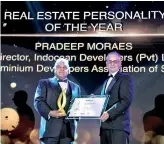  ??  ?? Indocean Developers (Pvt.) Ltd Director and Condominiu­m Developers Associatio­n of Sri Lanka Chairman Pradeep Moraes (Left) receiving the award for Sri Lanka Real Estate Personalit­y of the Year