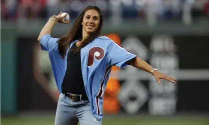  ??  ?? Carli Lloyd threw out the ceremonial first pitch before Tuesday’s game between the Phillies andthe Pirates in Philadelph­ia. Photograph: Matt Slocum/AP