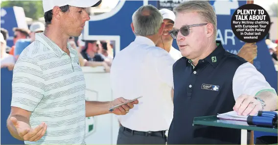  ??  ?? PLENTY TO TALK ABOUT Rory Mcilroy chatting with European Tour chief Keith Pelley in Dubai last weekend