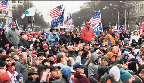  ?? Saul Loeb / AFP via Getty Images ?? Supporters of President Donald Trump hold a rally as they protest Wednesday’s electoral college certificat­ion of Joe Biden as president in Washington on Tuesday.