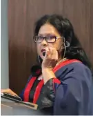  ??  ?? Acting Mayor Charlotte Clarke takes on the daunting task of delivering a mayoral address the day after Mayor Melvin Naik’s suspension from the DA.
