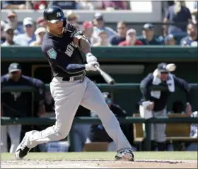  ?? JOHN RAOUX - THE ASSOCIATED PRESS ?? New York Yankees’ Giancarlo Stanton hits a double in the fourth inning during a spring baseball exhibition game against the Detroit Tigers, Tuesday, March 6, 2018, in Lakeland, Fla.