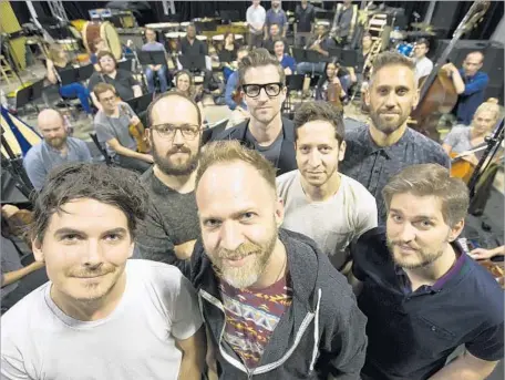  ?? Photograph­s by Kirk McKoy Los Angeles Times ?? THE ECHO SOCIETY is made up of seven composers. In front are Brendan Angelides, left, Nathan Johnson and Judson Crane. In back, from left, are Joe Trapanese, Benjamin Wynn, Jeremy Zuckerman and Rob Simonsen. The first show was in 2013 at Mack Sennett...