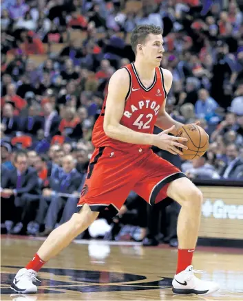  ?? VAUGHN RIDLEY/GETTY IMAGES ?? Jakob Poeltl of the Toronto Raptors dribbles the ball during the second half of the Raptors’ game against the Chicago Bulls on Oct. 19.
