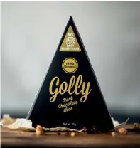  ??  ?? ALL GOOD Ramya Ragupathi (top) founded Oh My Goodness!, with a mission to make gluten-, dairy- and refined sugar-free food, such as its signature Golly dark chocolate cake (left), more readily available in Singapore