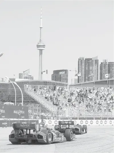  ?? LAURA PEDERSEN / NATIONAL POST ?? Exhibition Place route is one of IndyCar’s temporary circuit courses, where Toronto Indy drivers get to zip around on the roads that locals are more familiar with being pure gridlock during rush hour the other 51 weeks of the year.