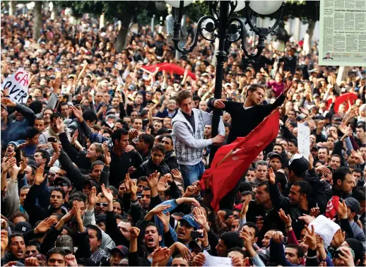  ?? Reuters ?? A demonstrat­ion against former Tunisian President Zine El-Abidine Ben Ali in Tunis on Jan. 14, 2011.