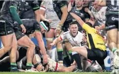  ??  ?? Victory roar: John Cooney celebrates Rob Herring’s try