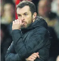  ??  ?? BAD START Stoke’s new manager Nathan Jones looks glum