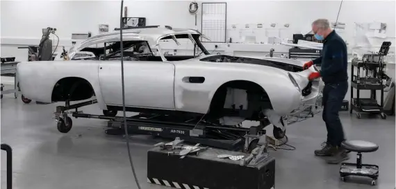  ??  ?? Each of the 25 new cars is being built using a blend of Sir David Brown-era old world craftsmans­hip, with the applicatio­n of modern engineerin­g advancemen­ts and performanc­e enhancemen­ts.