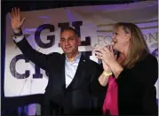  ?? JAE C. HONG — THE ASSOCIATED PRESS ?? Democrat Gil Cisneros and his wife, Jacki, acknowledg­e supporters at an election night party Nov. 6in Fullerton.