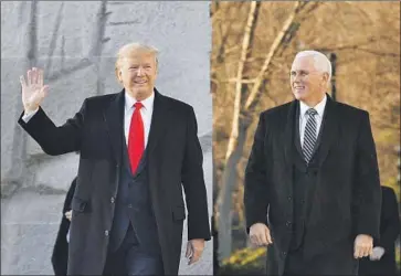  ?? Nicholas Kamm AFP/Getty Images ?? PRESIDENT TRUMP with Vice President Mike Pence at the Martin Luther King Jr. Memorial on Monday. Trump’s attorneys argue that the actions that prompted his impeachmen­t do not constitute a crime.