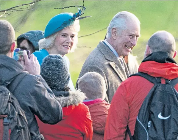  ?? ?? The King and Queen greeted members of the public as they arrived to attend a morning service at St Mary Magdalene Church in Sandringha­m, Norfolk yesterday