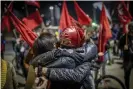  ??  ?? Communist party members in Santiago celebrate their victories in the constituti­onal assembly elections. Photograph: Felipe Figueroa/SOPA Images/REX/Shuttersto­ck