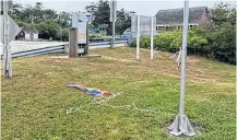  ?? FACEBOOK ?? The pride flag lays on the ground after being cut from the special purpose flagpole in the Municipali­ty of Barrington in 2020.