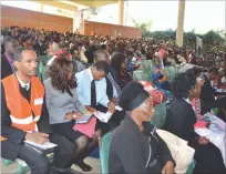  ??  ?? Members of the Jehovah’s Witnesses Church follow proceeding­s during their convention meeting at Bulawayo’s Amphitheat­re on Friday