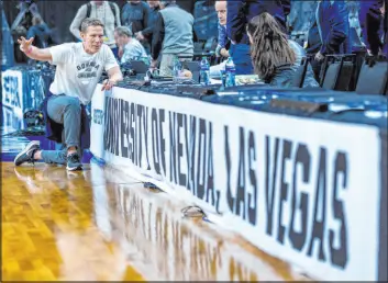  ?? L.E. Baskow Las Vegas Review-journal @Left_eye_images ?? Gonzaga coach Mark Few chats with a small group on the sidelines at T-mobile Arena as his team prepares for a Sweet 16 matchup with UCLA.