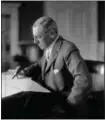  ?? COURTESY OF THE LIBRARY OF CONGRESS ?? President Woodrow Wilson writing at his desk.