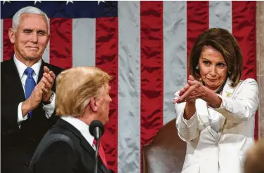  ?? Doug Mills / AFP/Getty Images ?? House Speaker Nancy Pelosi gives what some are calling a “walrus clap” or a “clap jeer” as President Donald Trump arrives to deliver the State of the Union address Tuesday night.