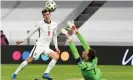  ??  ?? Mason Mount scores England’s second in their comfortabl­e 2-0 victory over Albania in Tirana. Photograph: Gent Shkullaku/AFP/ Getty Images